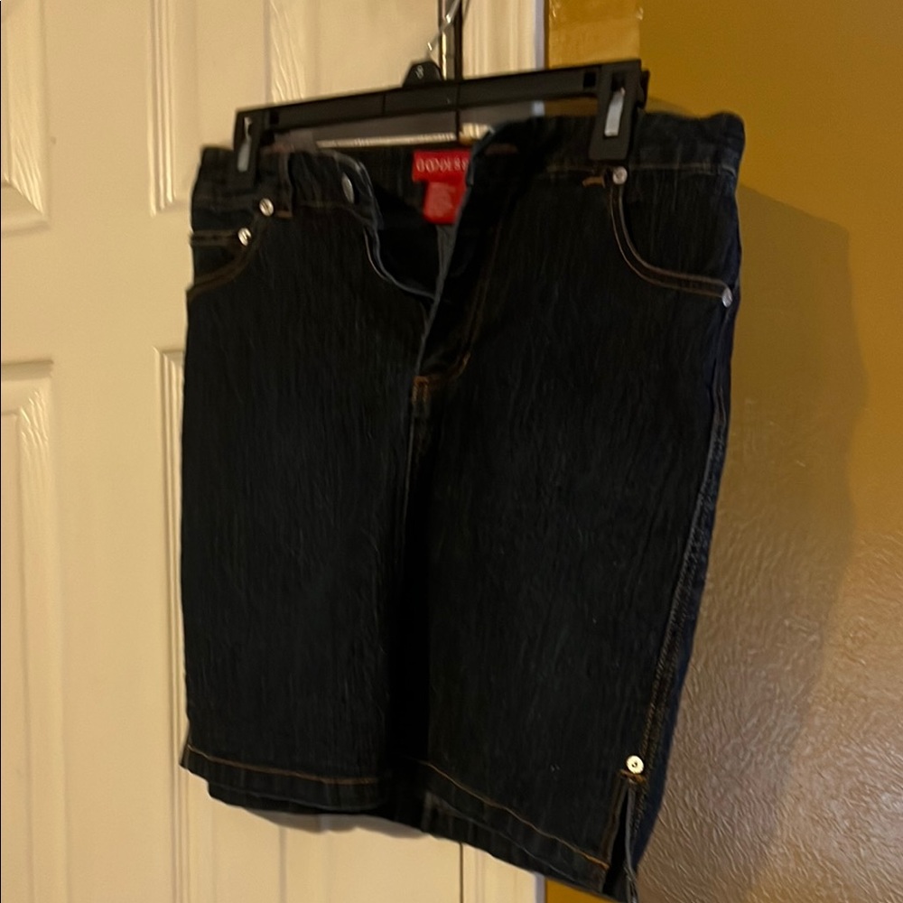 Dark Denim Skirt with pink embroidery on back pockets. Size 7/8.
